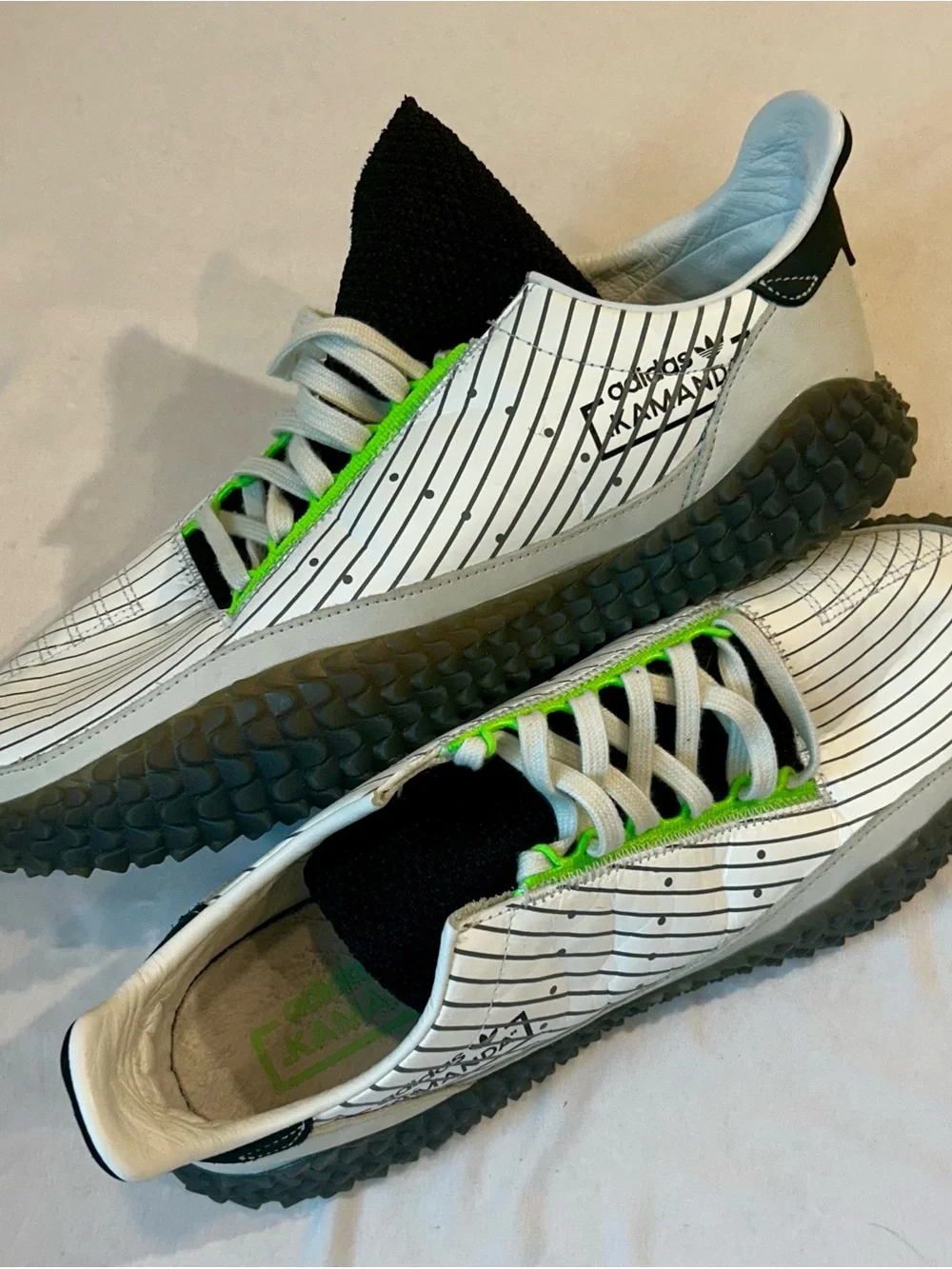 adidas mens Kamanda White Sneakers with Black and Neon Green Accents